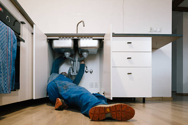 Professional Plumbing technician working in Salem, IN